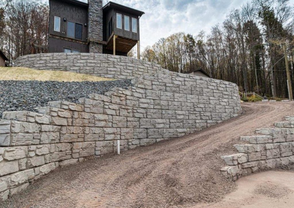 Whisper Rock Perimeter Wall Rebuilds: Block Hauling and Dumpsters