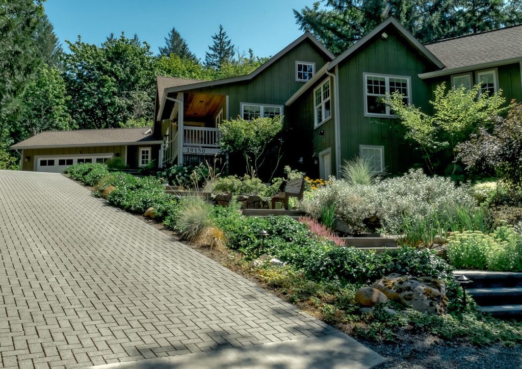 Whisper Rock Driveway Redesign: Old Concrete and Paver Disposal