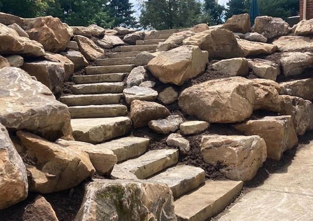 Whisper Rock Rock Wall and Boulder Feature Demolition and Hauling
